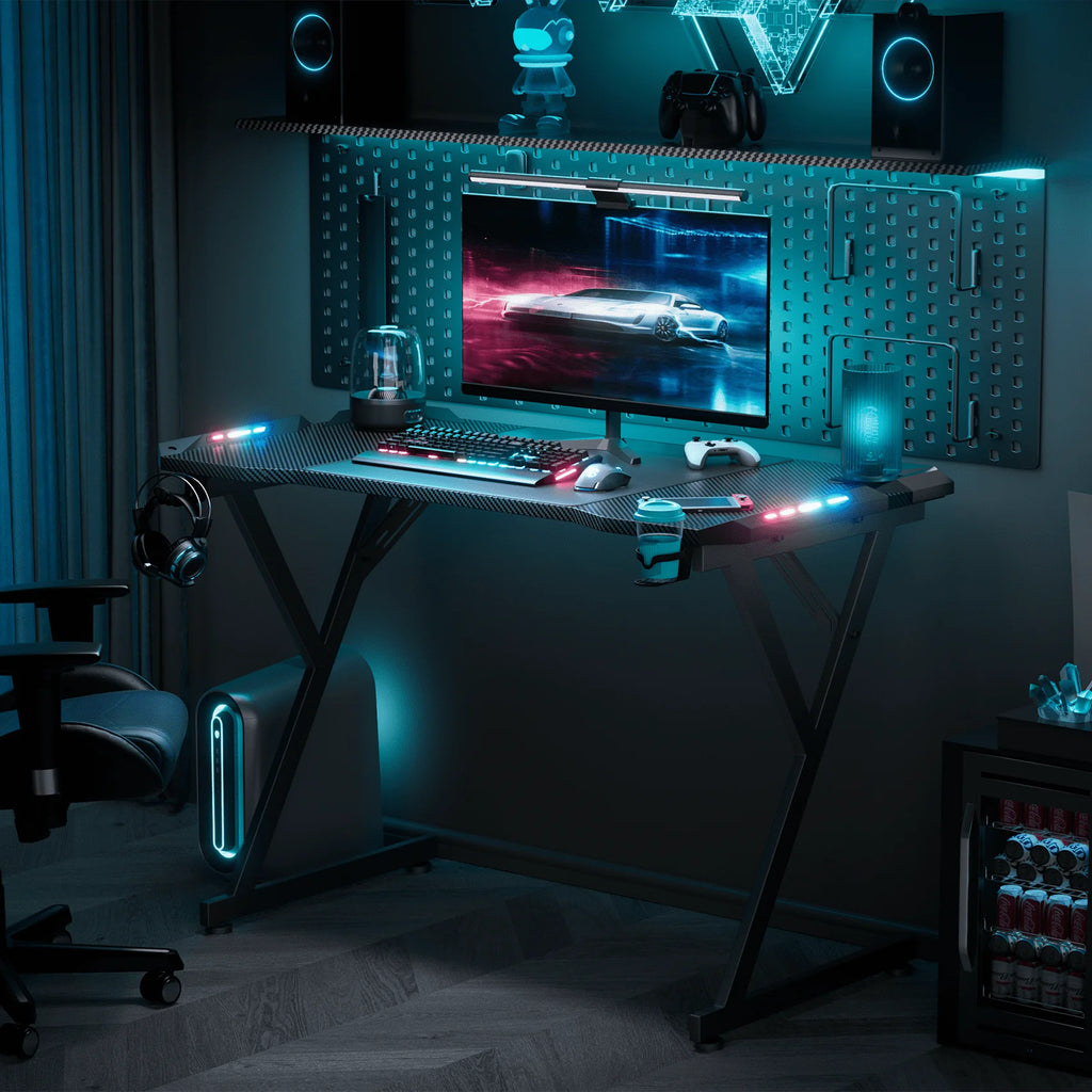 HLDIRECT 47 Inch Gaming Desk with LED Lights, Ergonomic Computer Gaming Table with Carbon Fibre Surface, Sturdy PC Workstation Desk for Gaming and Home Office with Headphone Hook, Cup Holder, Black